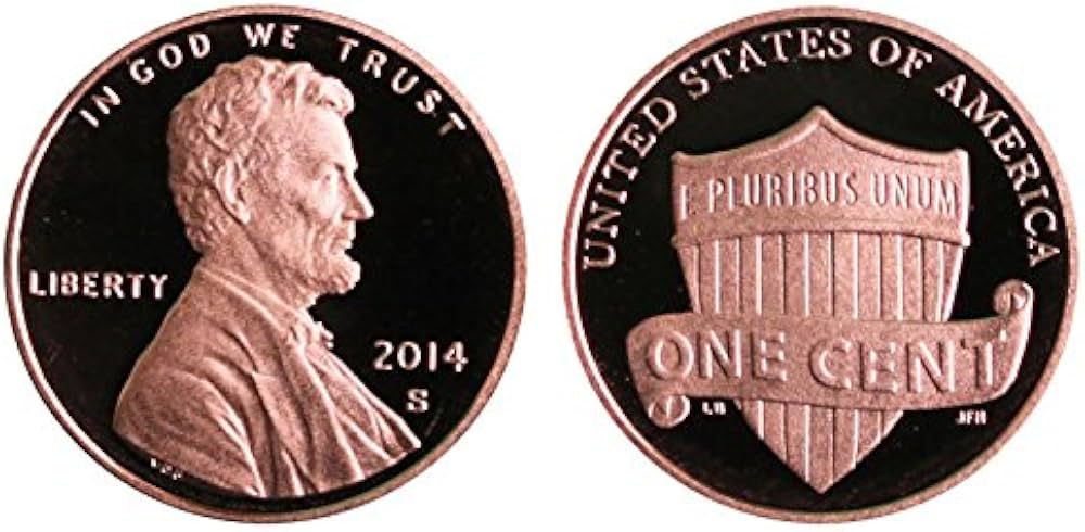 Group of 2014 Lincoln Shield cents in various grades and conditions alongside mint facility reference