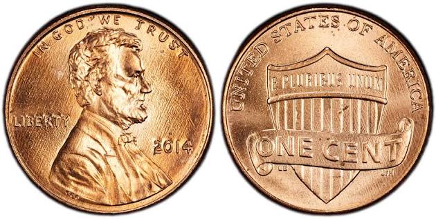 2014 Lincoln penny grading strip showing worn, circulated, uncirculated, and gem examples side by side